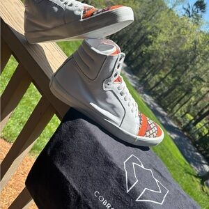White and Orange Athletic High-Top Shoes